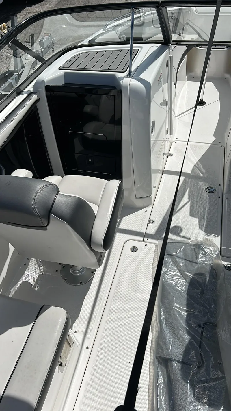 Slide: The Image of 2019 Yamaha Boats AR240 interior with seating and console. - 18