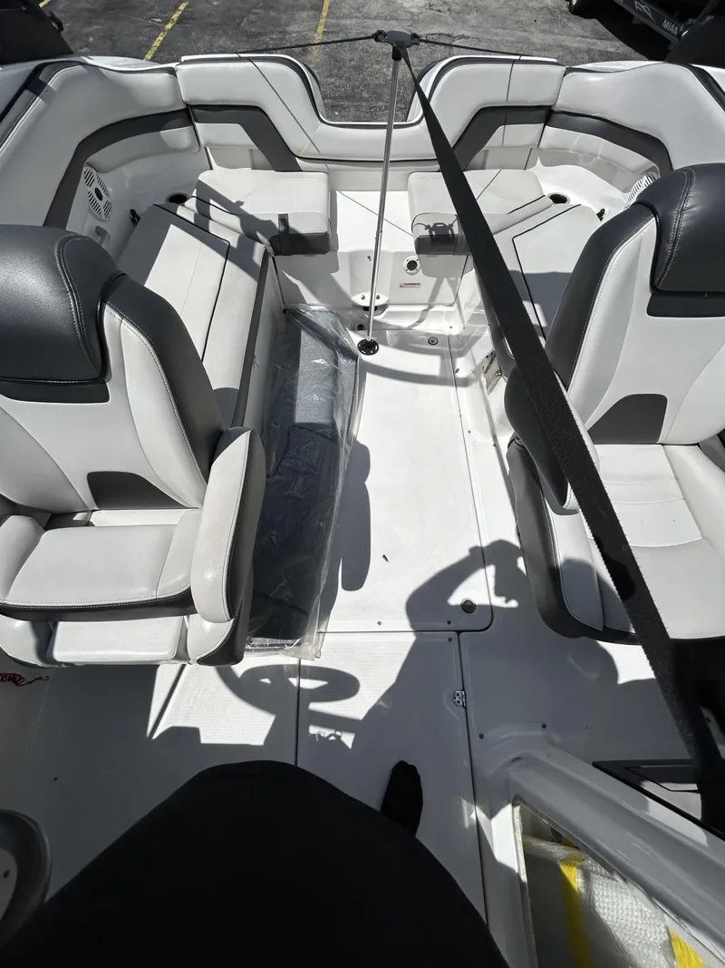 Slide: The Image of 2019 Yamaha Boats AR240 interior with seating and steering wheel. - 30