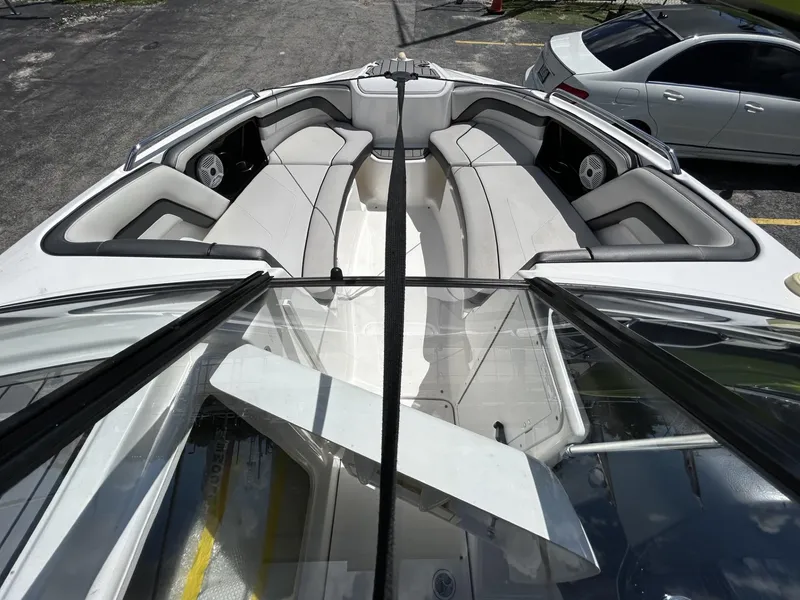 Slide: The Image of 2019 Yamaha Boats AR240 interior with spacious seating and sleek design. - 31