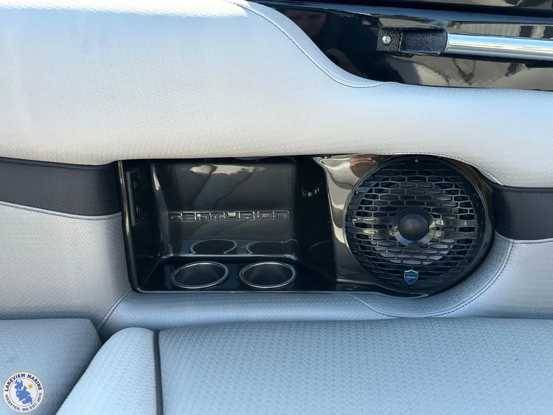 Slide: The Image of 2023 Centurion Vi22 boat interior with speaker and cup holders. - 15