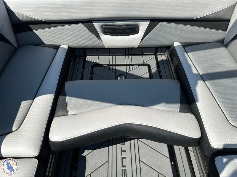 Slide: The Image of 2023 Centurion Vi22 boat interior with gray seating and sleek design. - 16