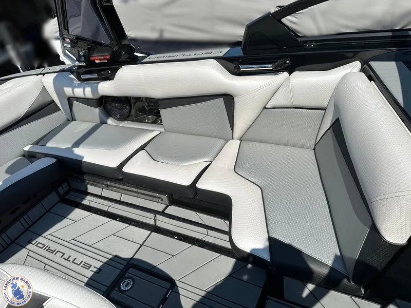 Slide: The Image of 2023 Centurion Vi22 boat interior with modern seating and sleek design. - 17