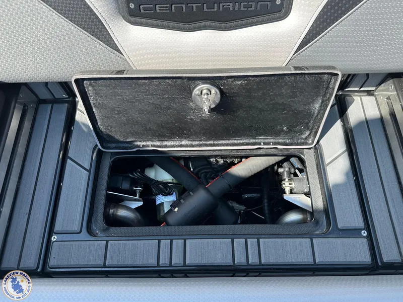 Slide: The Image of 2023 Centurion Vi22 engine compartment with open hatch, showcasing internal components. - 18