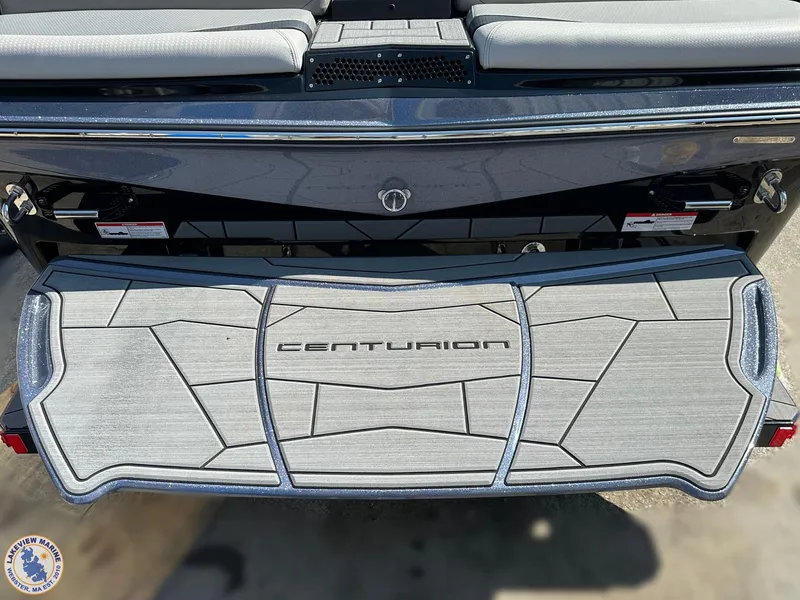 Slide: The Image of 2023 Centurion Vi22 boat swim platform with stylish design and logo. - 20