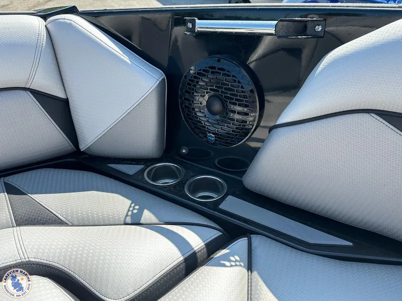 Slide: The Image of 2023 Centurion Vi22 boat interior with speaker and cup holders. - 5