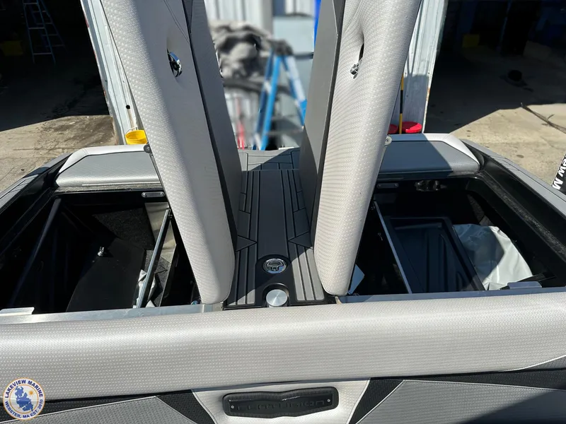 Slide: The Image of 2023 Centurion Vi22 boat interior with open storage compartments. - 6