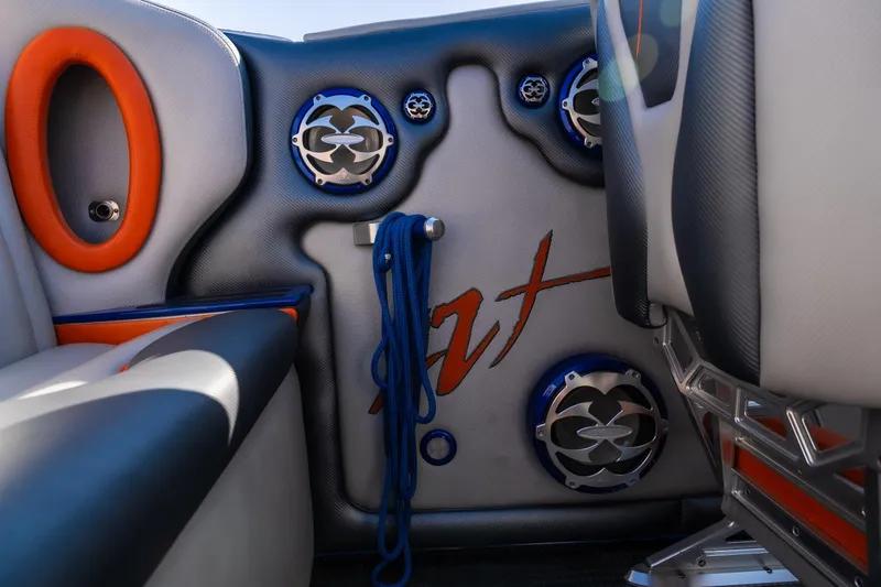 Slide: The Image of Interior of 2007 Cigarette 42X boat with custom speakers and vibrant upholstery. - 14