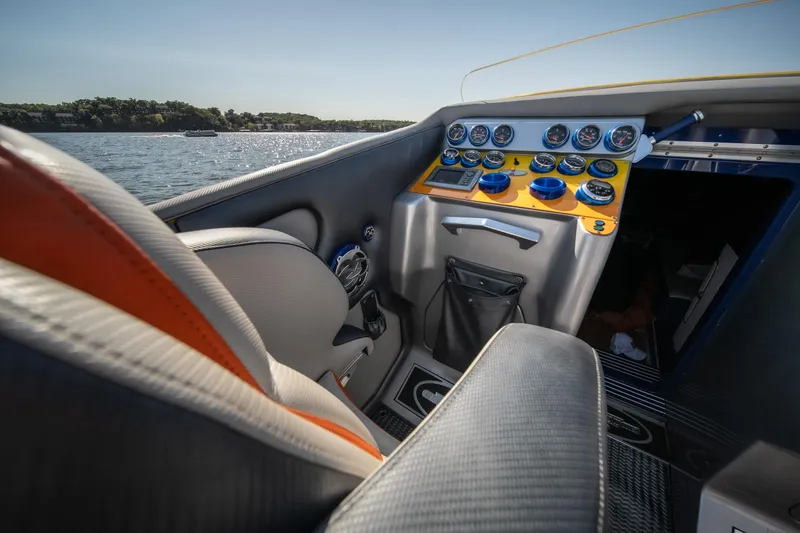 Slide: The Image of Interior of 2007 Cigarette 42X boat with dashboard and seating. - 22