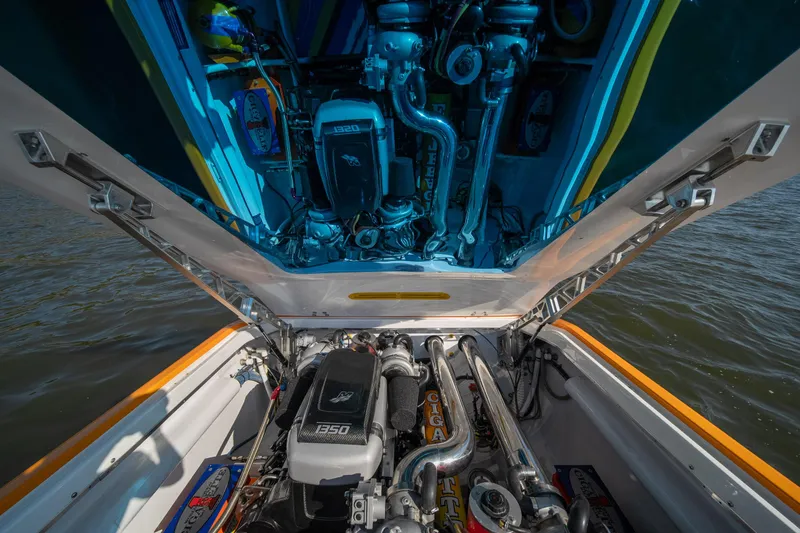 Slide: The Image of 2007 Cigarette 42X boat engine compartment with high-performance components. - 30