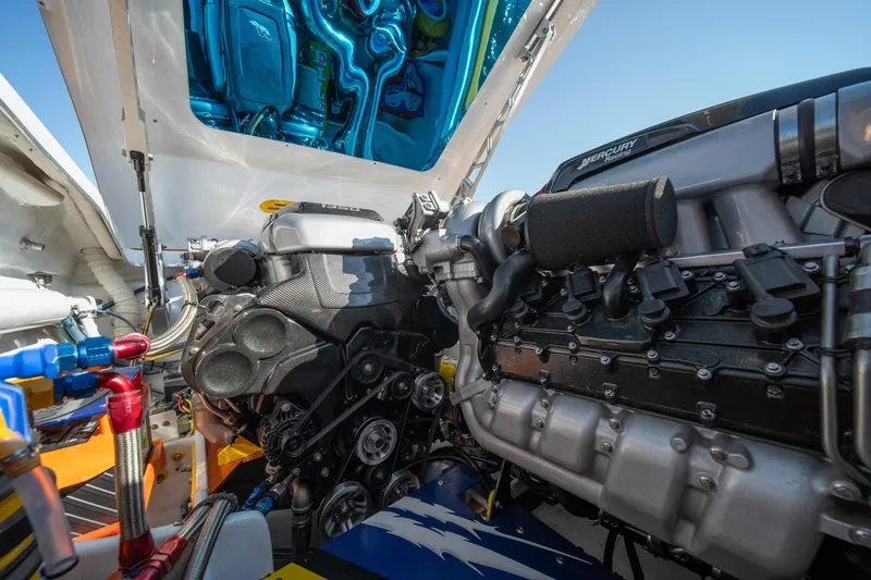 Slide: The Image of 2007 Cigarette 42X engine compartment with high-performance components and open hatch. - 34