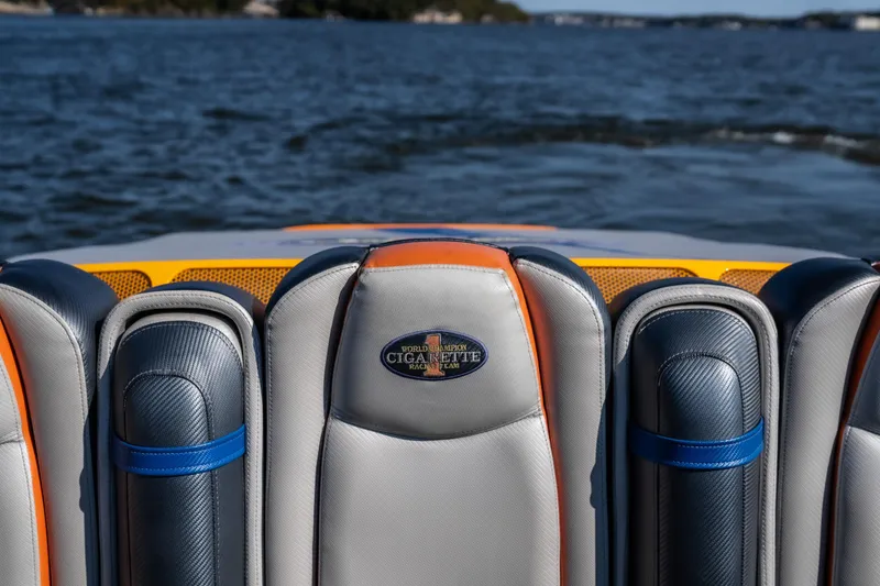 Slide: The Image of 2007 Cigarette 42X boat seats with logo, on a lake. - 8