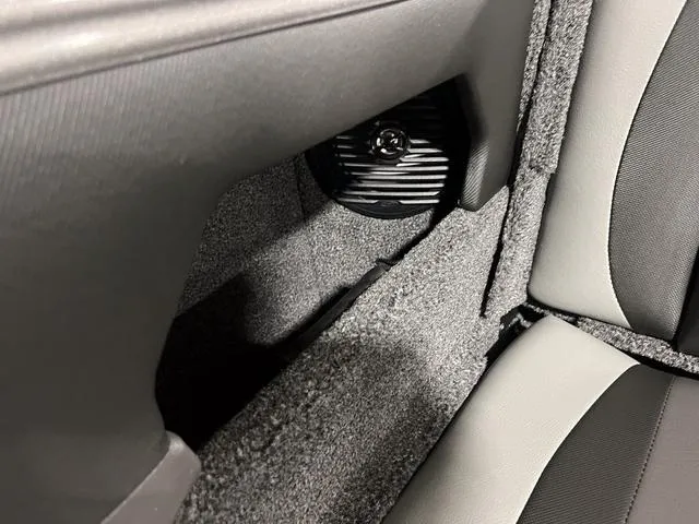 Slide: The Image of Interior of 2025 Lund 2075 Tyee Sport boat, featuring speaker and seating. - 8