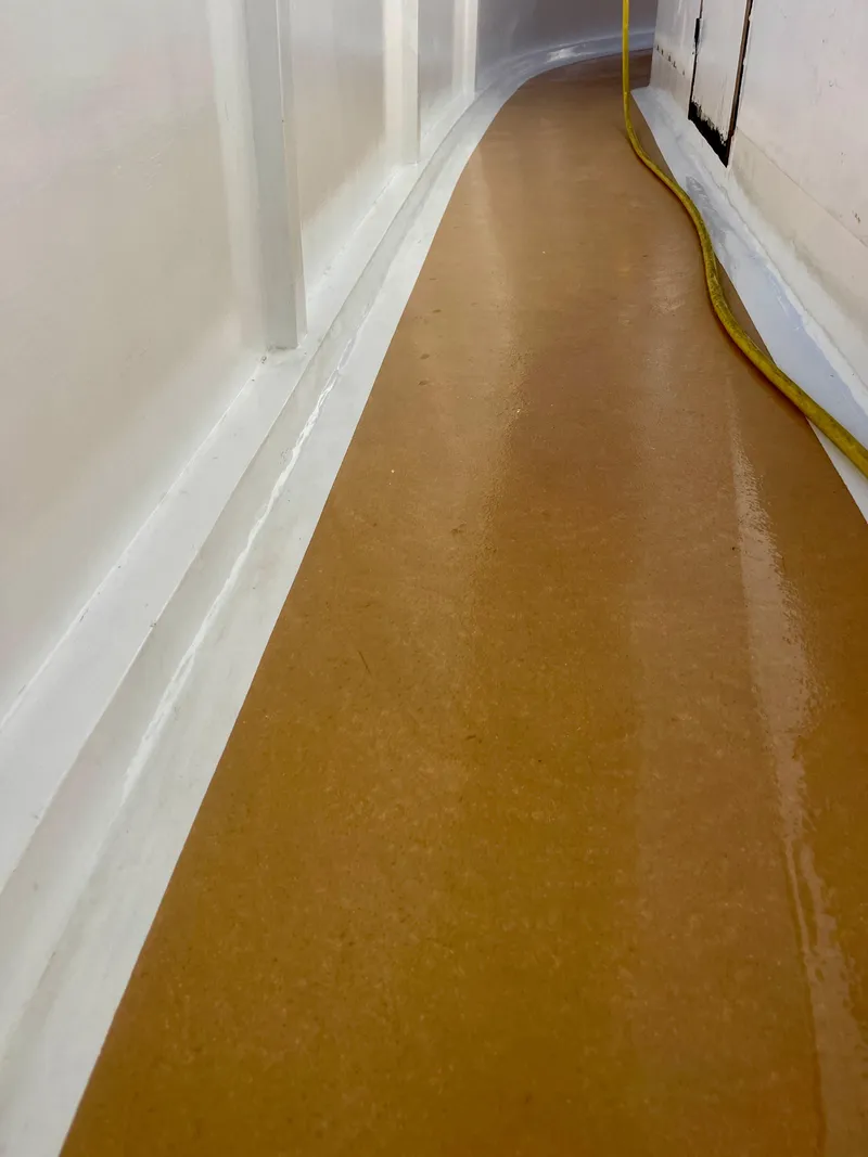 Slide: The Image of Wet deck of 1977 Grand Alaskan Raised Pilothouse with yellow hose. - 24