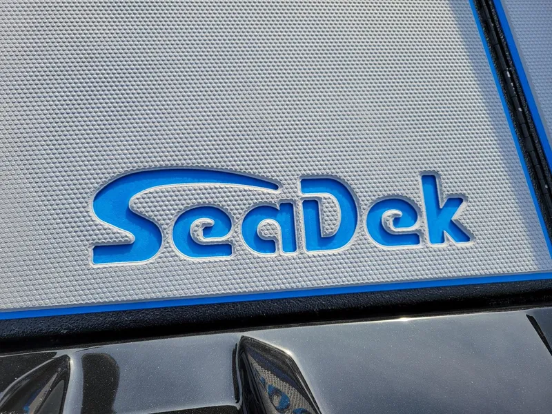 Slide: The Image of SeaDek logo on Xpress H17C 2025 Crappie boat, textured surface detail. - 14