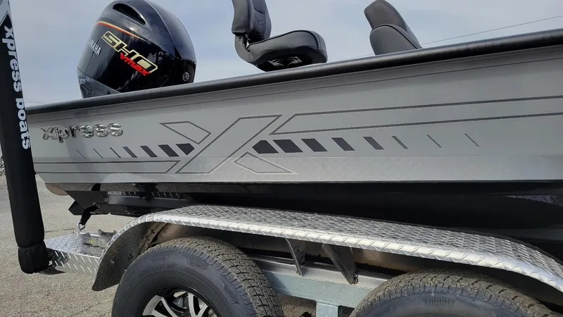 Slide: The Image of 2025 Xpress X19 Pro boat with Yamaha Vmax 175 engine on trailer. - 12