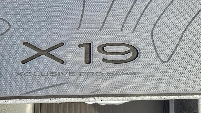 Slide: The Image of 2025 Xpress X19 Pro boat floor mat with embossed logo design. - 17
