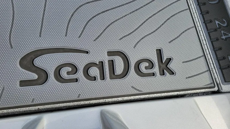 Slide: The Image of SeaDek flooring on 2025 Xpress X19 Pro boat with Yamaha Vmax 175 engine. - 18