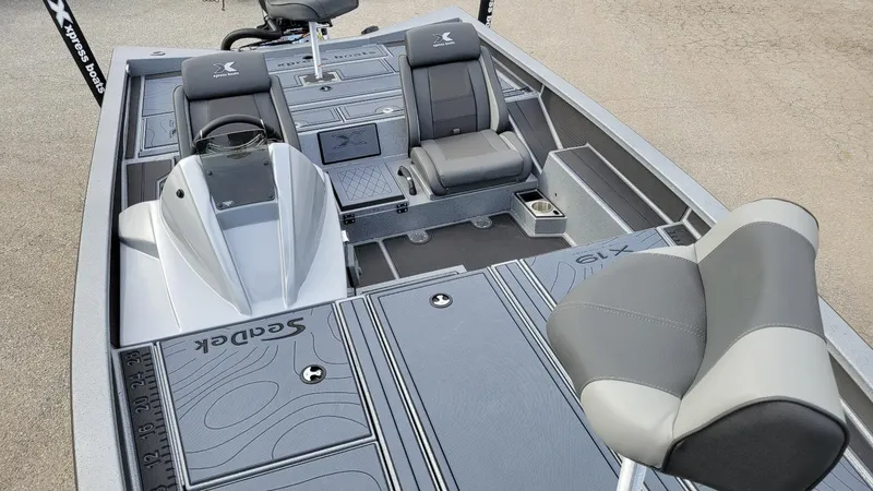 Slide: The Image of 2025 Xpress X19 Pro boat interior with Yamaha Vmax 175, featuring sleek seating and deck design. - 20