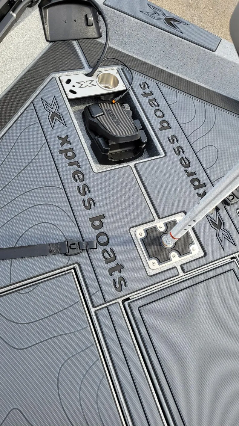 Slide: The Image of 2025 Xpress X19 Pro boat deck with Yamaha Vmax 175, featuring sleek design and branding. - 7