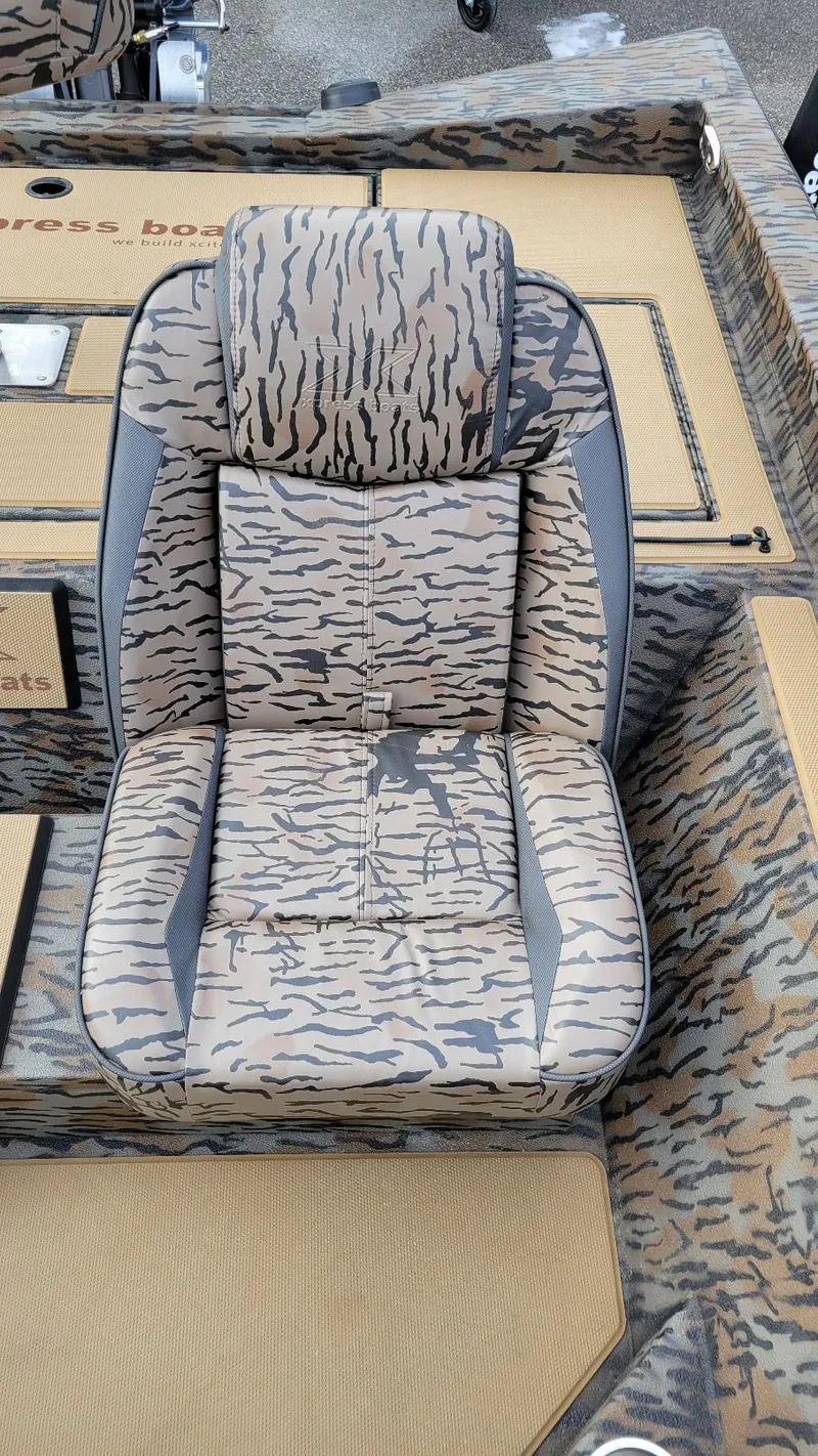 Slide: The Image of 2025 Xpress H17 Bass boat seat with camouflage pattern and Yamaha Vmax 90 SHO engine. - 15