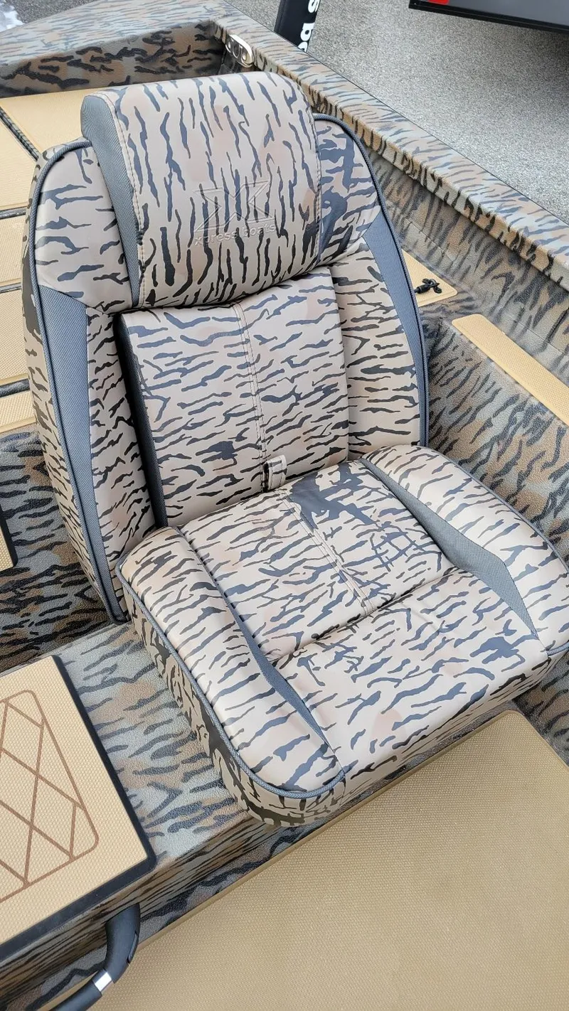 Slide: The Image of 2025 Xpress H17 Bass boat seat with camouflage pattern and Yamaha Vmax 90 SHO engine. - 16