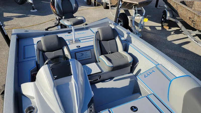 Slide: The Image of 2025 Xpress H17 Bass boat interior with Yamaha Vmax 90 SHO engine, in stock. - 10