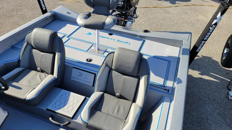 Slide: The Image of 2025 Xpress H17 Bass boat interior with Yamaha Vmax 90 SHO engine, featuring comfortable seating. - 15