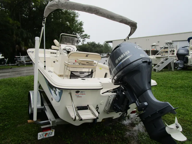 Slide: The Image of 2022 Carolina Skiff 19 LS boat with Yamaha outboard motor on trailer. - 5