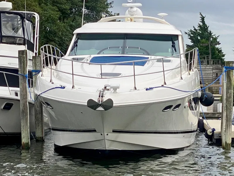 Slide: The Image of 2013 Sea Ray 580 Sundancer yacht docked in a marina. - 5