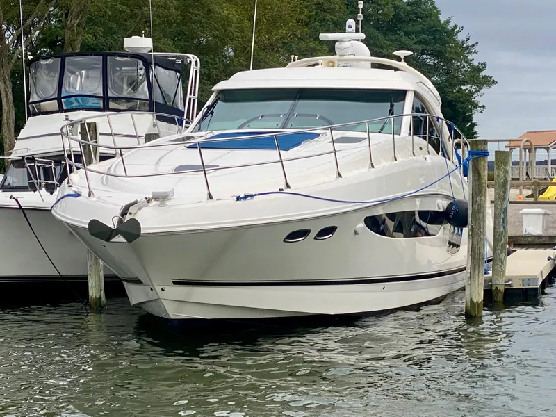 Slide: The Image of 2013 Sea Ray 580 Sundancer yacht docked in marina. - 7