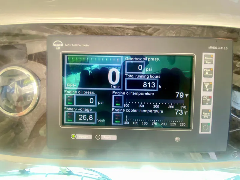 Slide: The Image of Dashboard of 2013 Sea Ray 580 Sundancer showing engine metrics and running hours. - 45