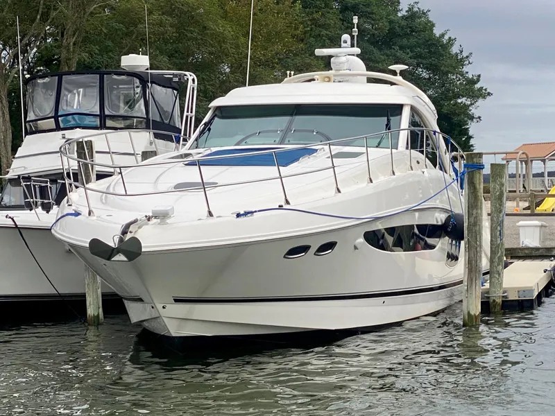 Slide: The Image of 2013 Sea Ray 580 Sundancer yacht docked at marina. - 6