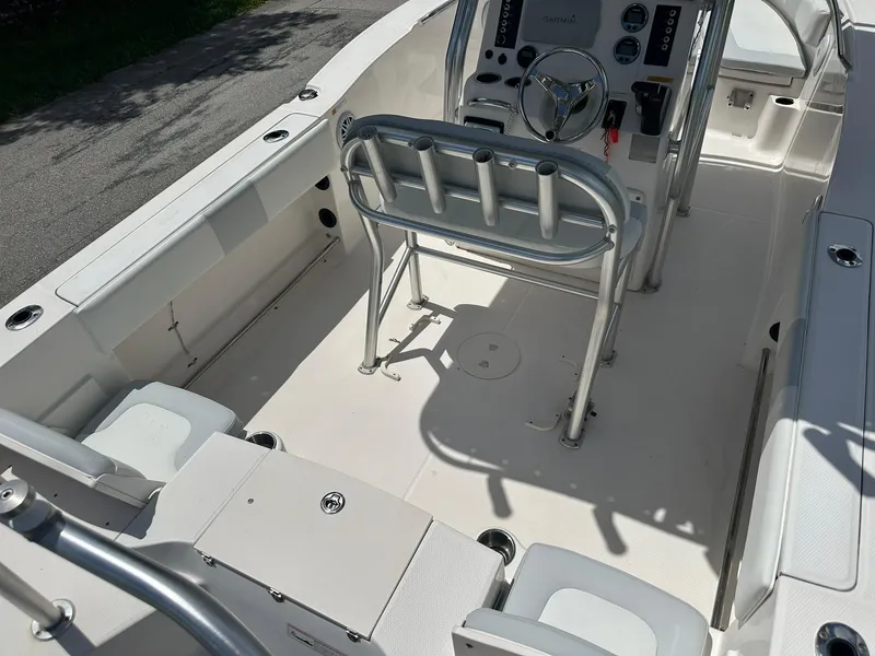 Slide: The Image of 2016 Robalo R200 Center Console boat interior with steering wheel and seating. - 10