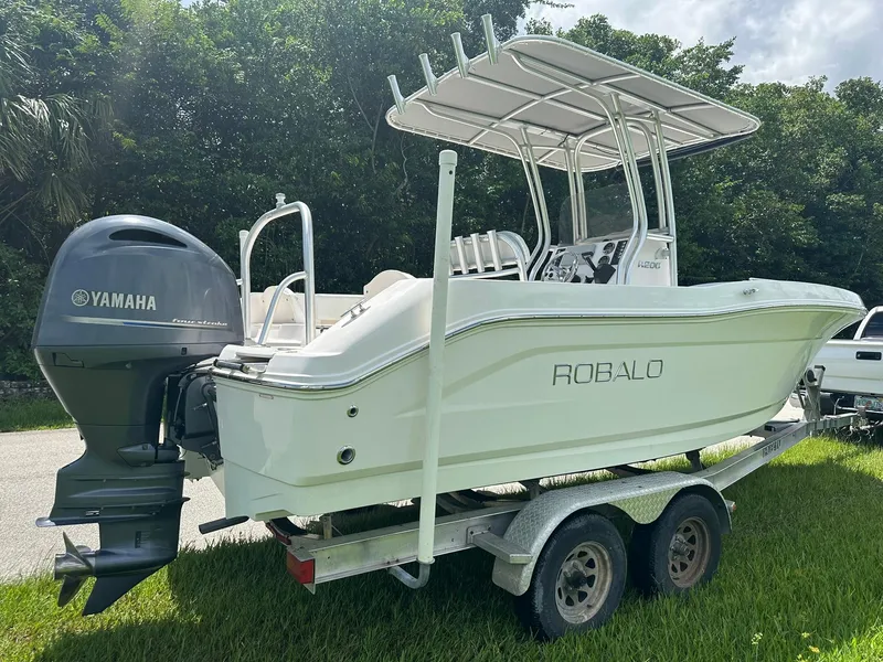 Slide: The Image of 2016 Robalo R200 Center Console boat on trailer with Yamaha outboard motor. - 3