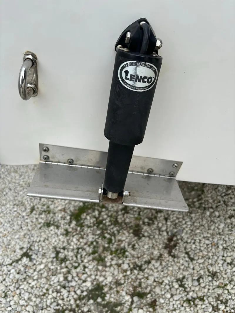 Slide: The Image of Lenco trim tab on 2017 Pro-Line 23 Sport boat. - 35