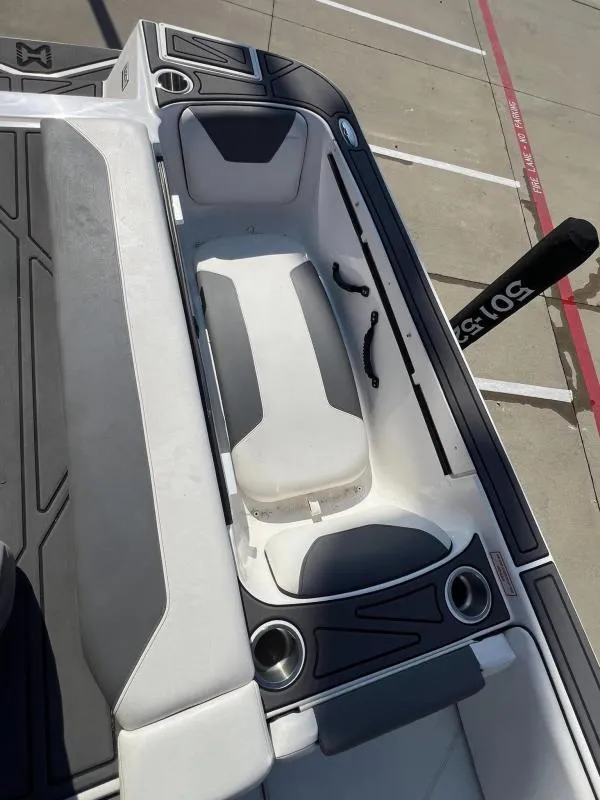 Slide: The Image of 2023 Heyday WTSurf boat interior with seating and cup holders. - 17