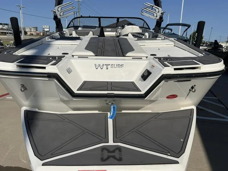 Slide: The Image of 2023 Heyday WTSurf boat rear view with sleek design and modern features. - 21
