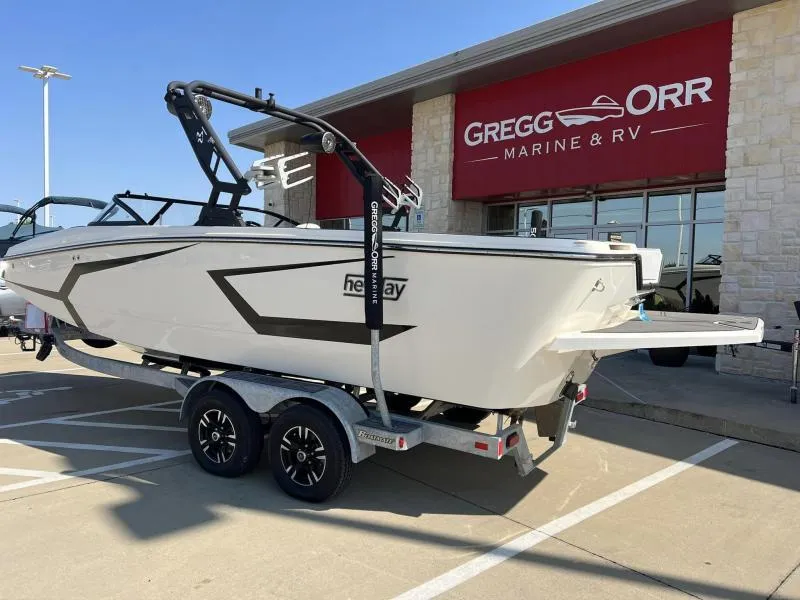 Slide: The Image of 2023 Heyday WTSurf boat on trailer at Gregg Orr Marine & RV dealership. - 3