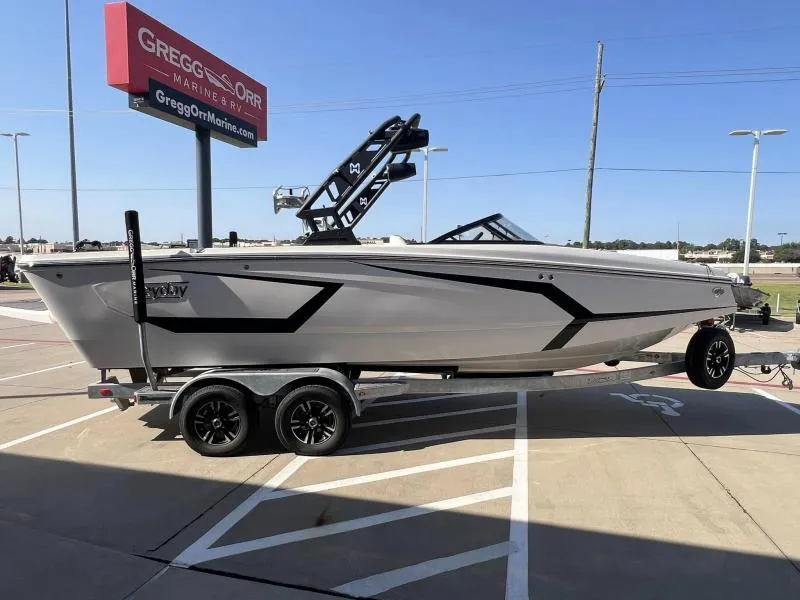 Slide: The Image of 2023 Heyday WTSurf boat on trailer at Gregg Orr Marine dealership. - 5