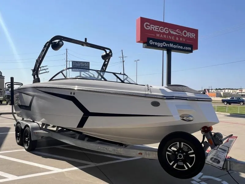 Slide: The Image of 2023 Heyday WTSurf boat on trailer at Gregg Orr Marine dealership. - 6