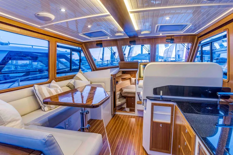 Slide: The Image of 2025 True North 39 Outboard Express boat layout with modern interior design. - 17