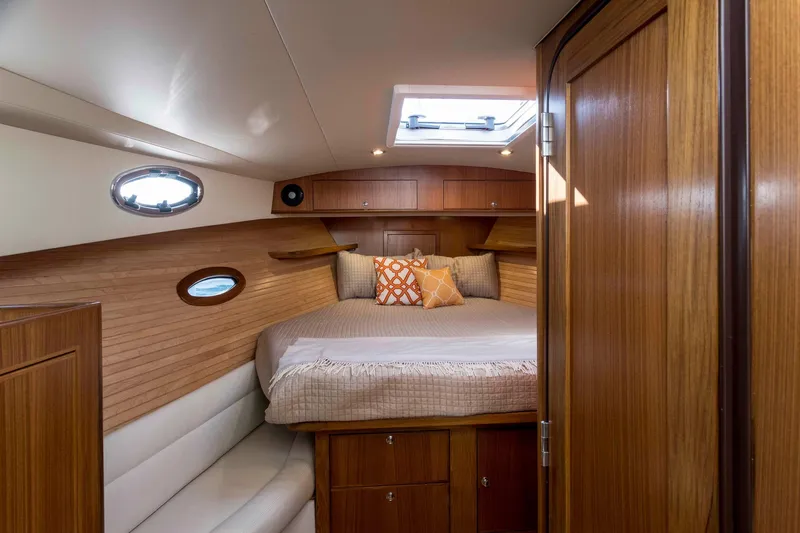 Slide: The Image of Top view of 2025 True North 39 Outboard Express boat with triple engines. - 18