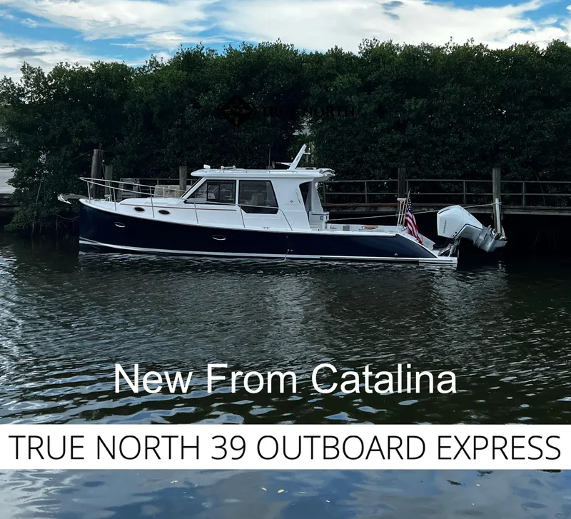 Slide: The Image of 2025 True North 39 Outboard Express boat on water, new Catalina model. - 2