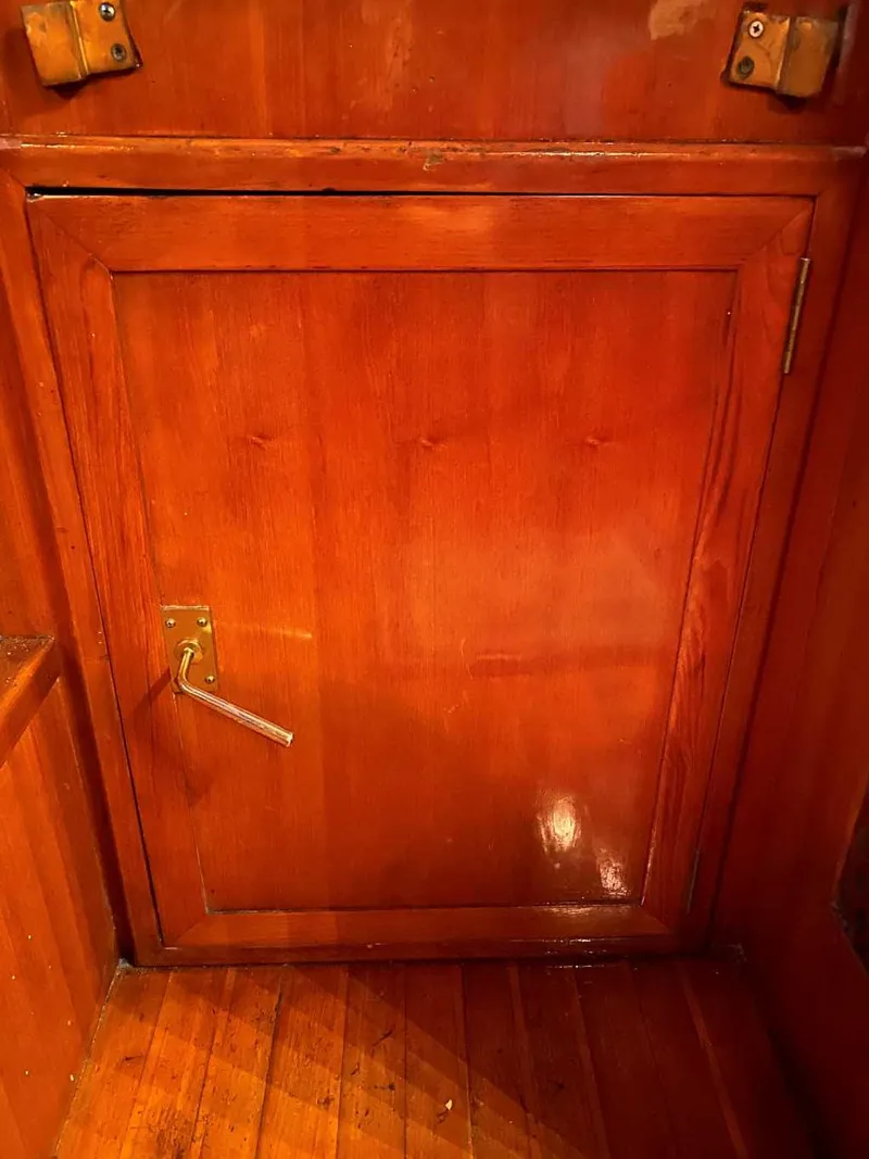 Slide: The Image of Wooden cabin door on 1984 Marine Trader Aft Cabin Motor Yacht. - 24
