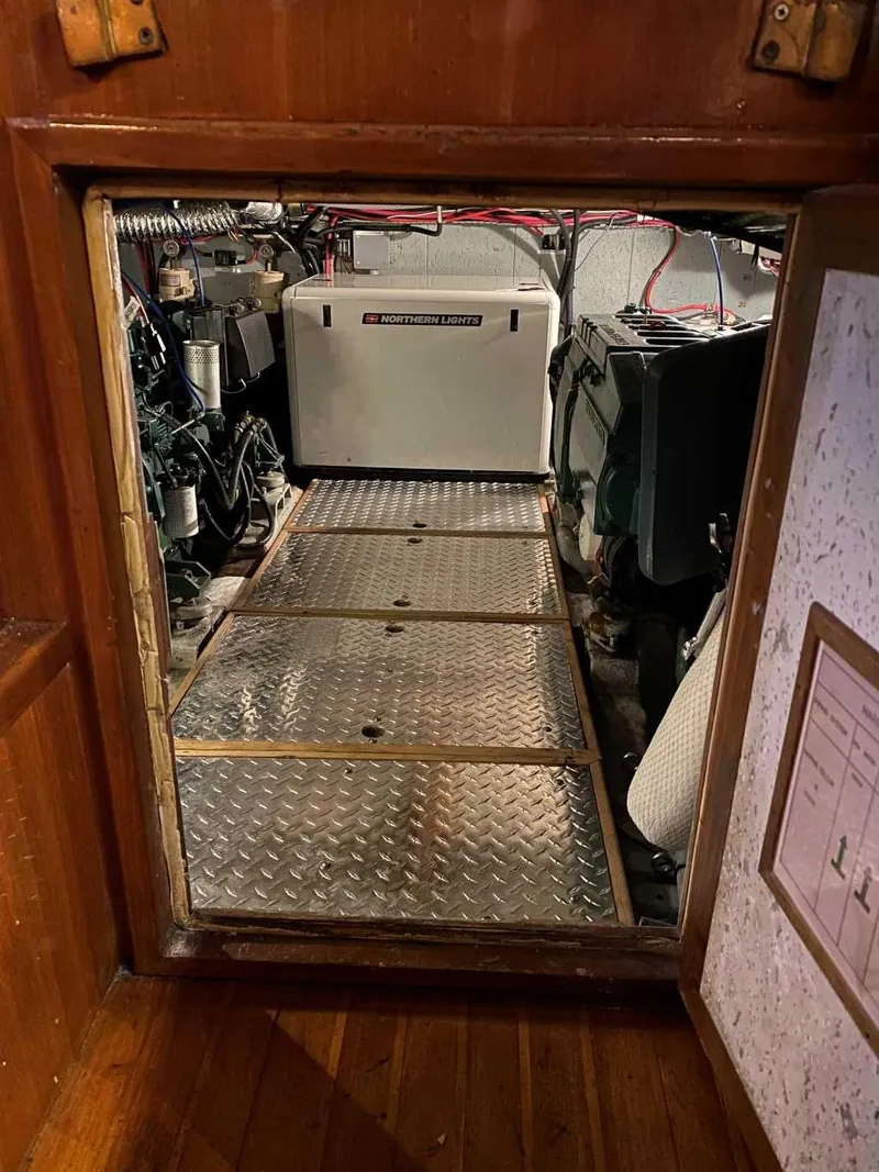 Slide: The Image of Engine room of 1984 Marine Trader Aft Cabin Motor Yacht with Northern Lights generator. - 25