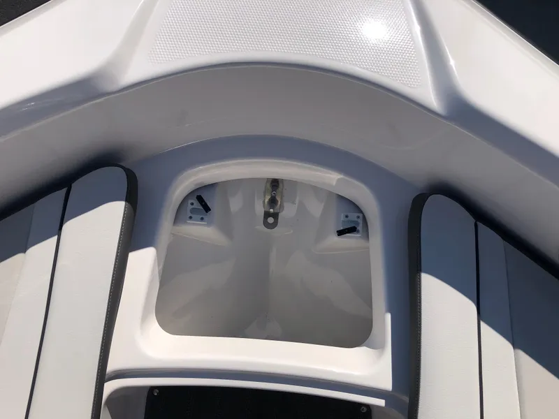 Slide: The Image of 2025 Yamaha Boats AR190 interior seating and storage area. - 39