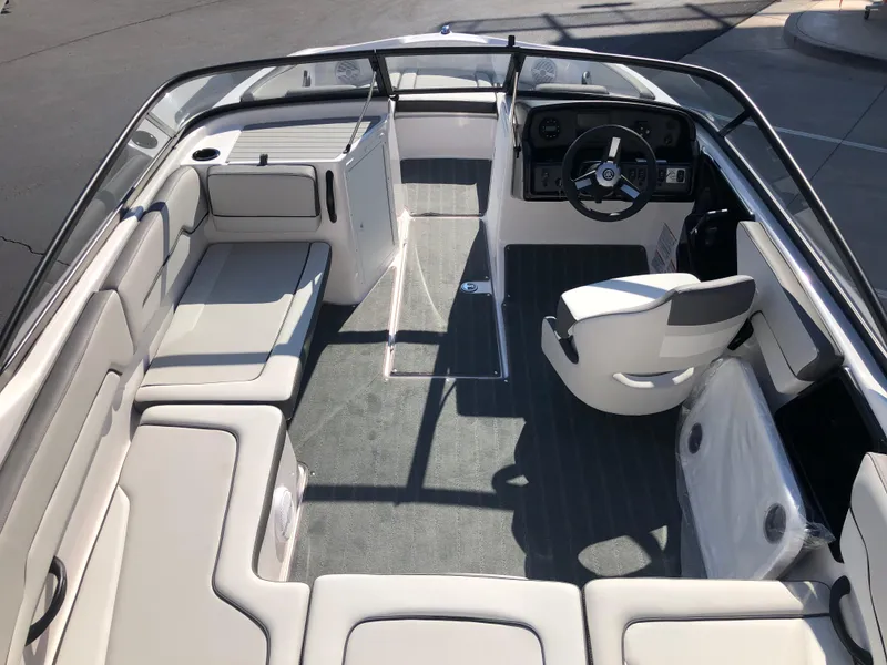 Slide: The Image of 2025 Yamaha Boats AR190 interior with sleek seating and modern dashboard design. - 41