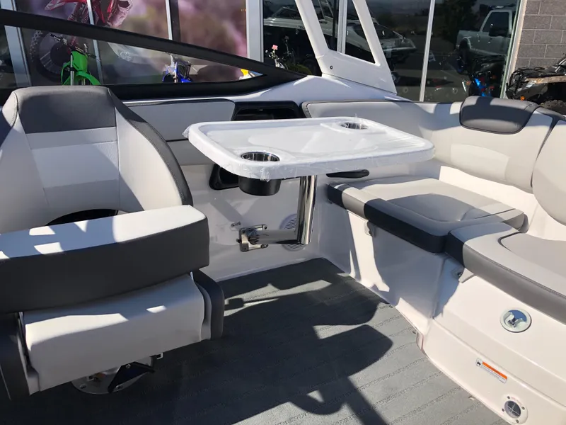 Slide: The Image of 2025 Yamaha Boats AR190 interior with seating and table setup. - 42
