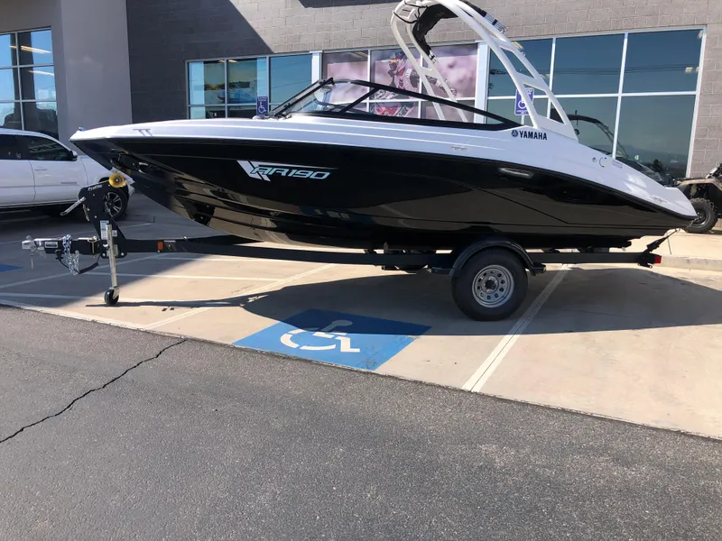 Slide: The Image of 2025 Yamaha Boats AR190 on trailer in parking lot. - 6