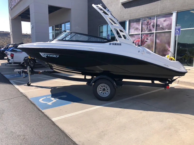 Slide: The Image of 2025 Yamaha Boats AR190 on trailer in parking lot. - 7